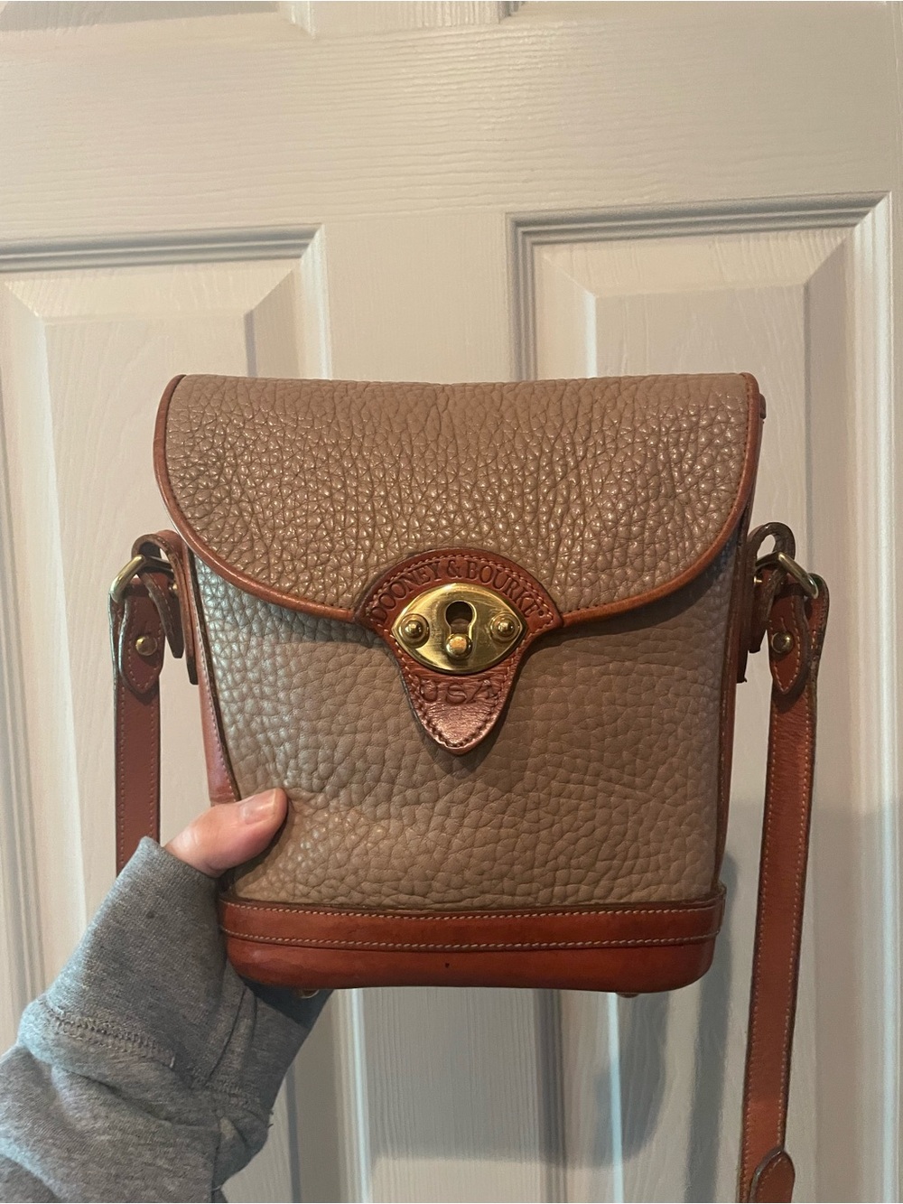Vintage Dooney & Bourke Taupe and British tan color Leather Crossbody Bag.
